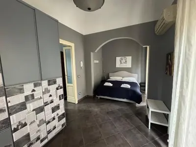 Letto o letti in una camera di Etna charme apartment