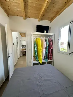 Letto o letti in una camera di Anastasia Beach Cottage POMELIA