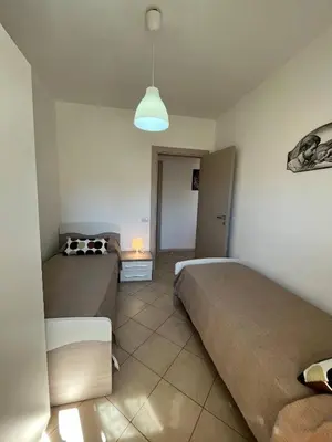 Letto o letti in una camera di first floor lido house with terrace for exclusive use
