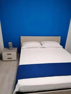 Letto o letti in una camera di Villa Porto fossa 2
