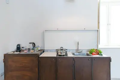 Cucina o angolo cottura di Apartment and Suite Mercato whit terrace
