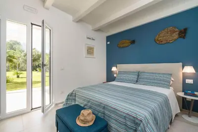 Letto o letti in una camera di Villa Malva