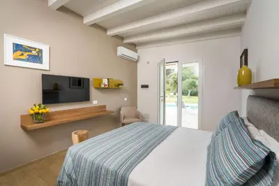 Letto o letti in una camera di Villa Malva