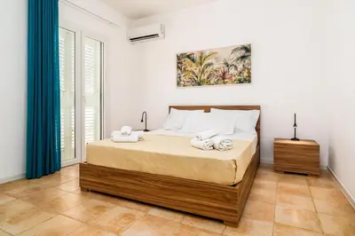Letto o letti in una camera di Villademar lunarossa