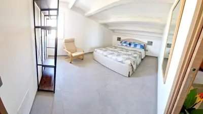 Letto o letti in una camera di Villa LORY SWEET ORCHIDEA