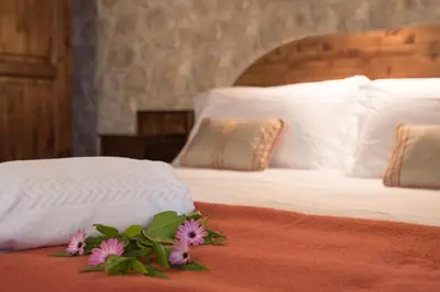 Letto o letti in una camera di Torre Don Virgilio Country Hotel