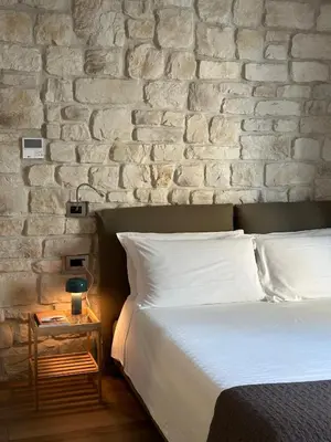 Letto o letti in una camera di Olivia Rooms Teocrito